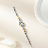 Klara® - Reloj dorado con cristales de colores