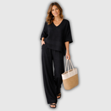 Paulina | Conjunto de lino negro con top asimétrico y pantalón palazzo