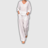 Paulina | Conjunto de lino negro con top asimétrico y pantalón palazzo