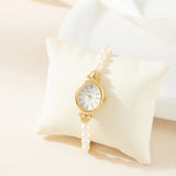 Ana® - Reloj dorado con pulsera de perlas