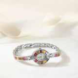 Klara® - Reloj dorado con cristales de colores