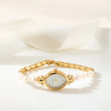 Ana® - Reloj dorado con pulsera de perlas