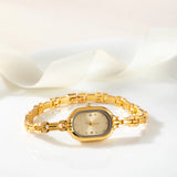 Helena® - Reloj dorado con esfera ovalada y marco negro