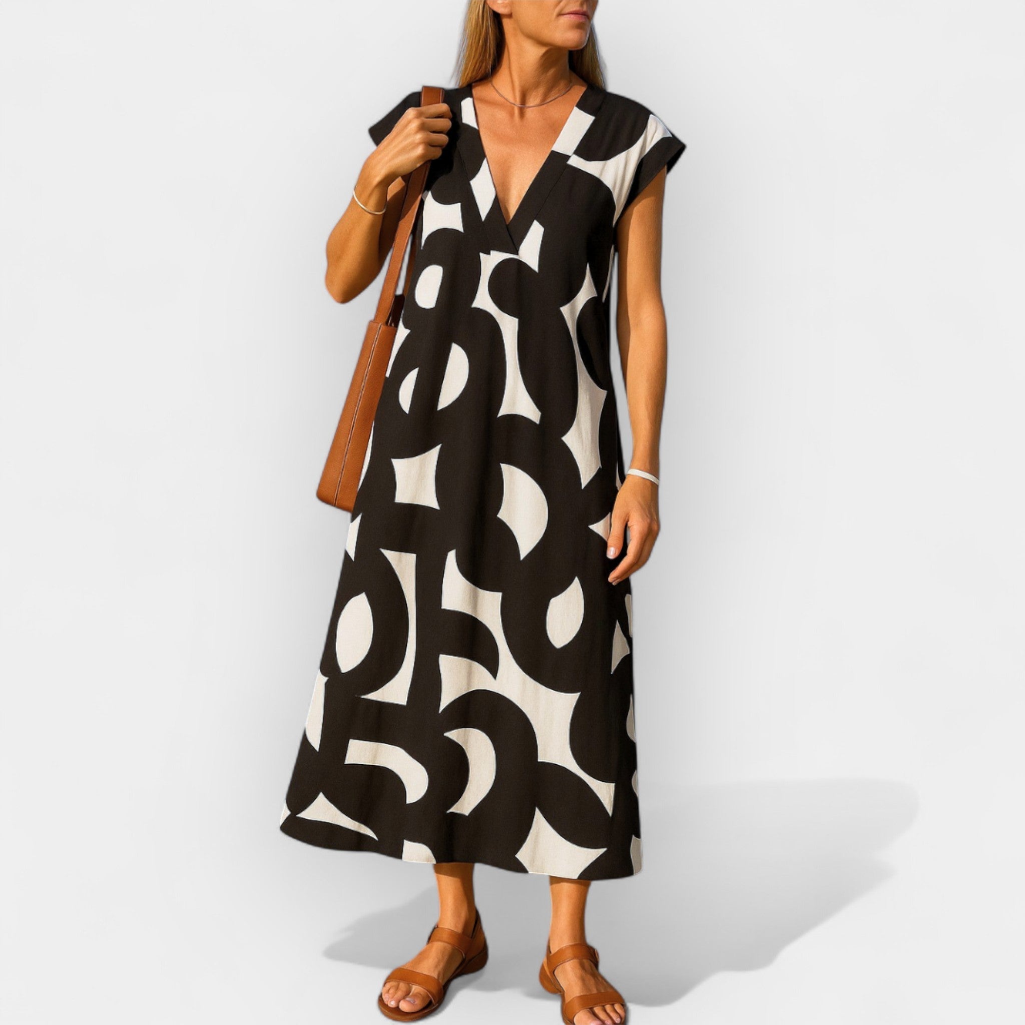 Hela – Vestido aéreo elegante con escote en V