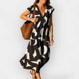 Hela – Vestido aéreo elegante con escote en V