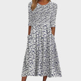 Vita - Vestido midi con flores y bolsillos
