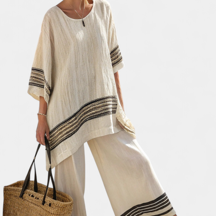 Mariella — Top elegante de lino con rayas negras y pantalones fluidos