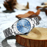 Nika® - Reloj plateado con esfera rosa