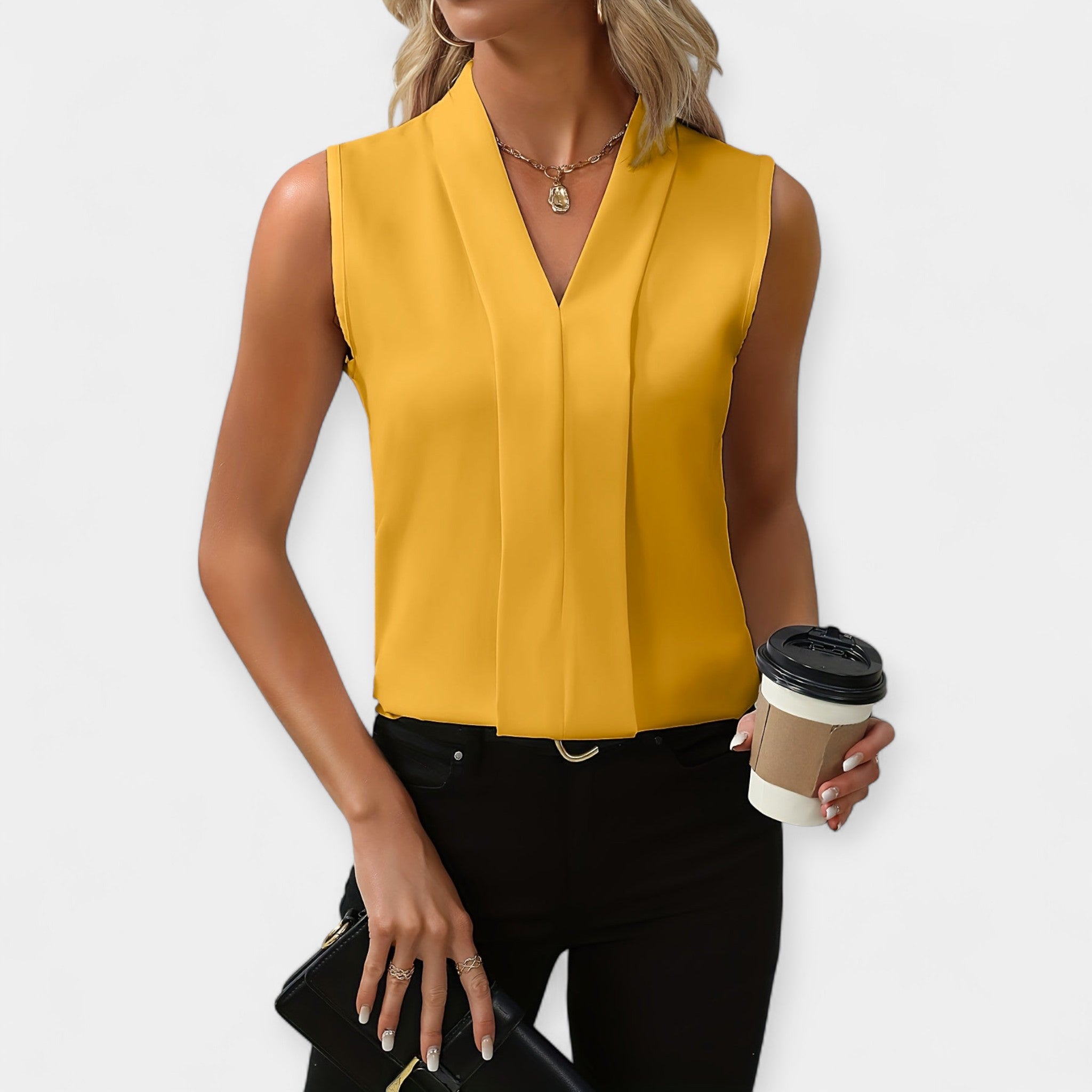 Marta – Blusa clásica sin mangas de estilo versátil
