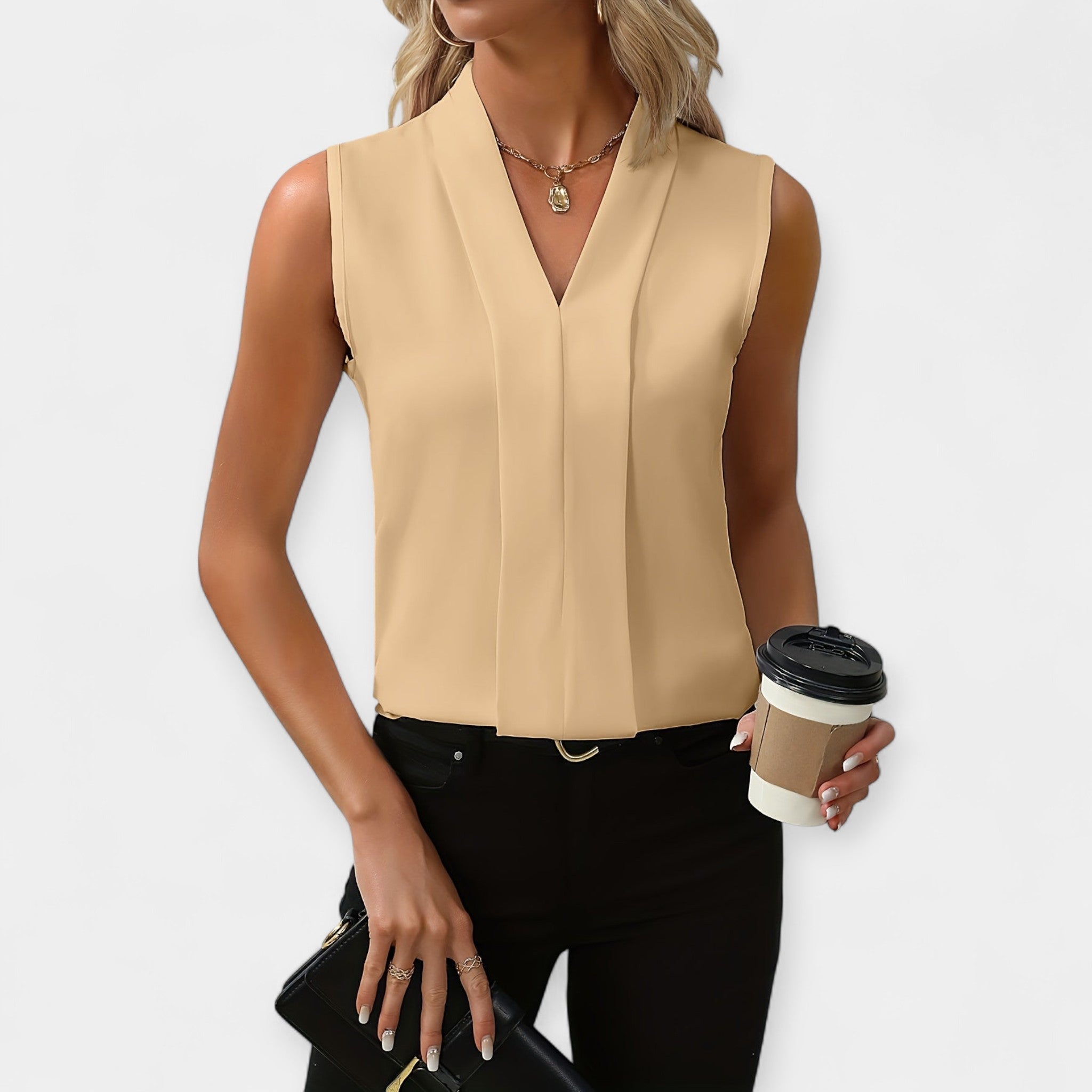 Marta – Blusa clásica sin mangas de estilo versátil