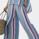 Ginevra — Top elegante en tono malva pastel y pantalones de lino a rayas