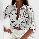 Camila – Blusa Geométrica Sofisticada